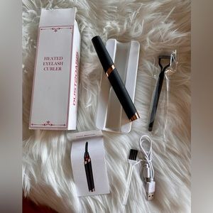 Heated eyelash curler, New!!  Complete set! Cordless!!